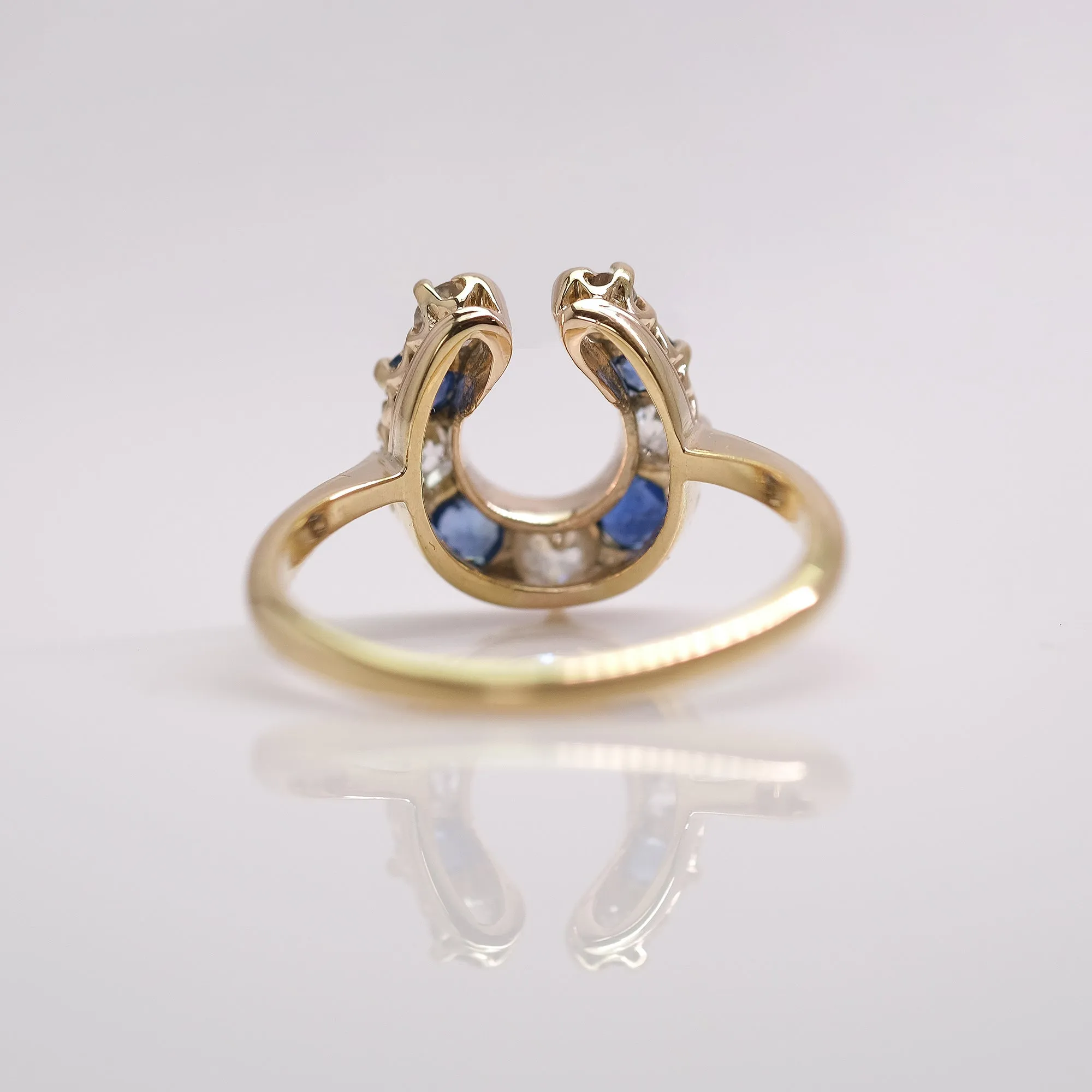 18 Carat Yellow Gold Sapphire and Diamond Horseshoe Ring