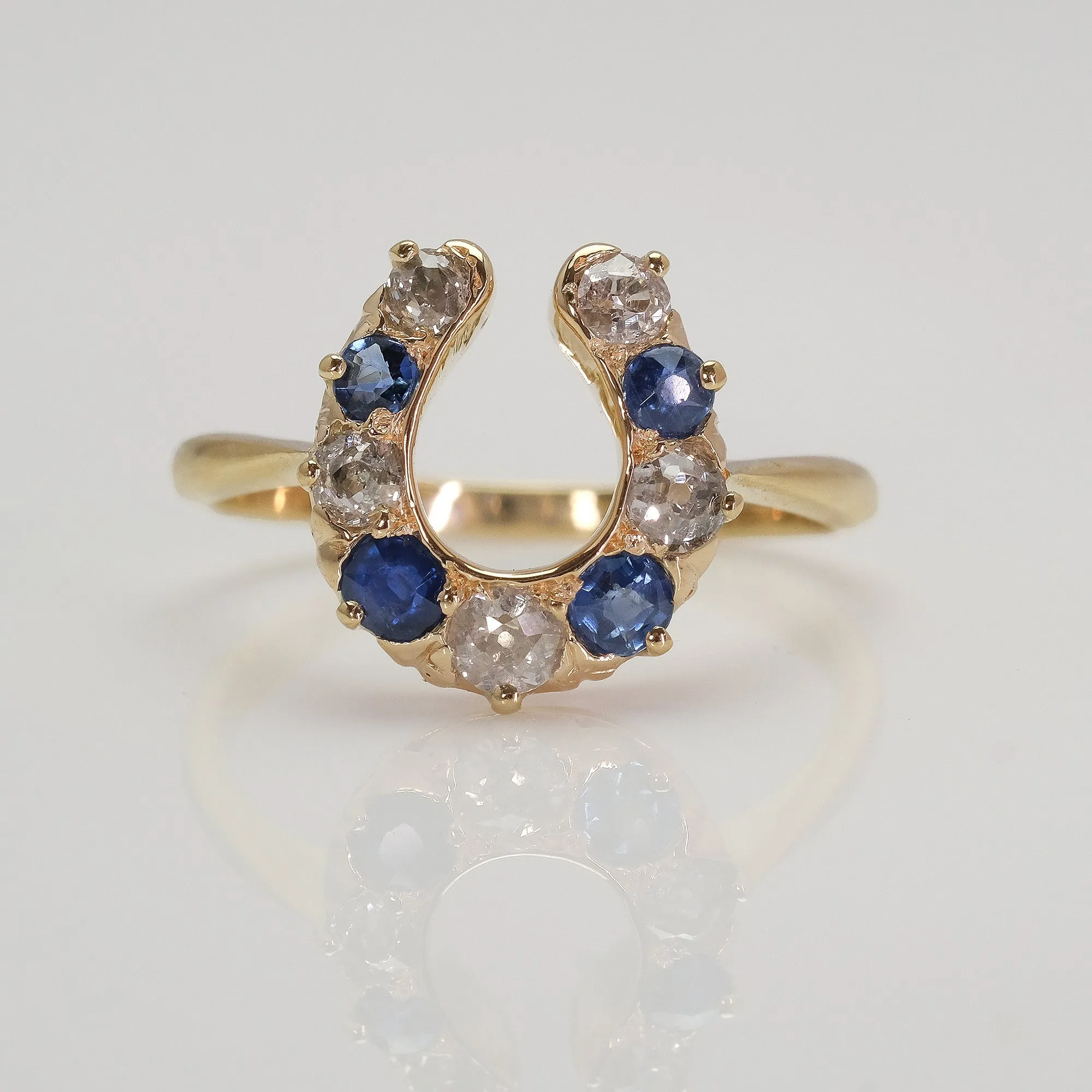 18 Carat Yellow Gold Sapphire and Diamond Horseshoe Ring