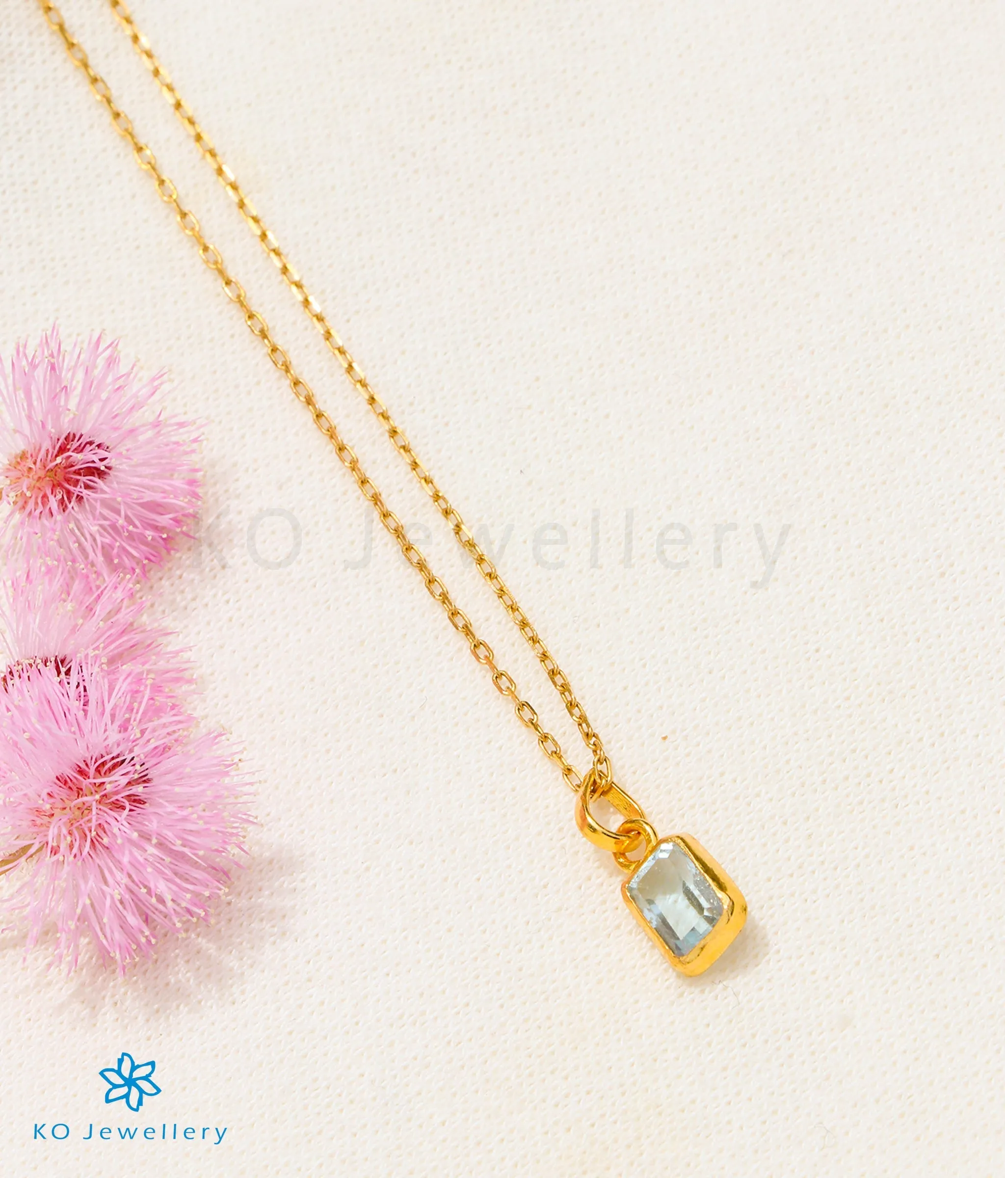 Bright Blue Topaz Pendant in 22 KT Gold