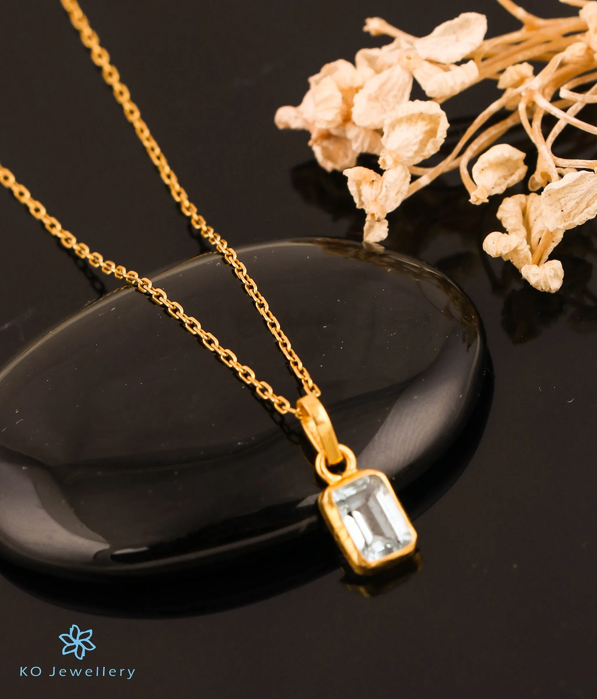 Bright Blue Topaz Pendant in 22 KT Gold